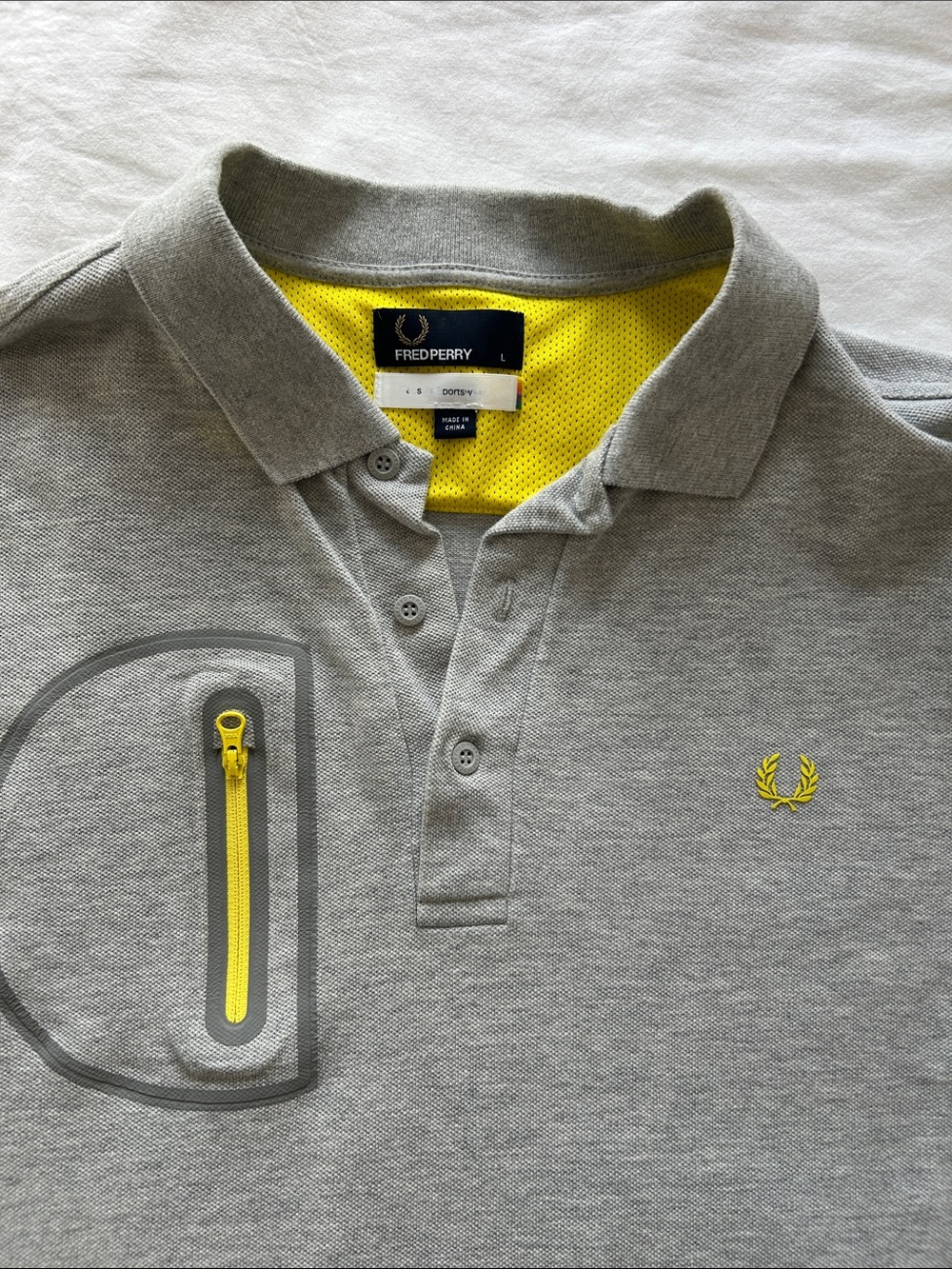 Fred Perry Grey Polo with Yellow Trim and Zip Pocket - Picture 2 of 3